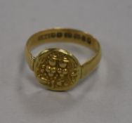 An Indian gold coin, mounted on a Victorian 22ct gold ring setting, Birmingham 1888, 5.6g