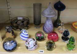 A collection of glass paperweights, vases etc