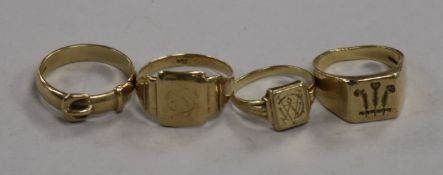 A 9ct gold 'Prince of Wales Feathers' signet ring and three other rings, including a 9ct gold buckle