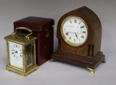 A mantel clock and a cased timepiece clock height 18cm