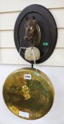 A wall mounted gong length 57cm