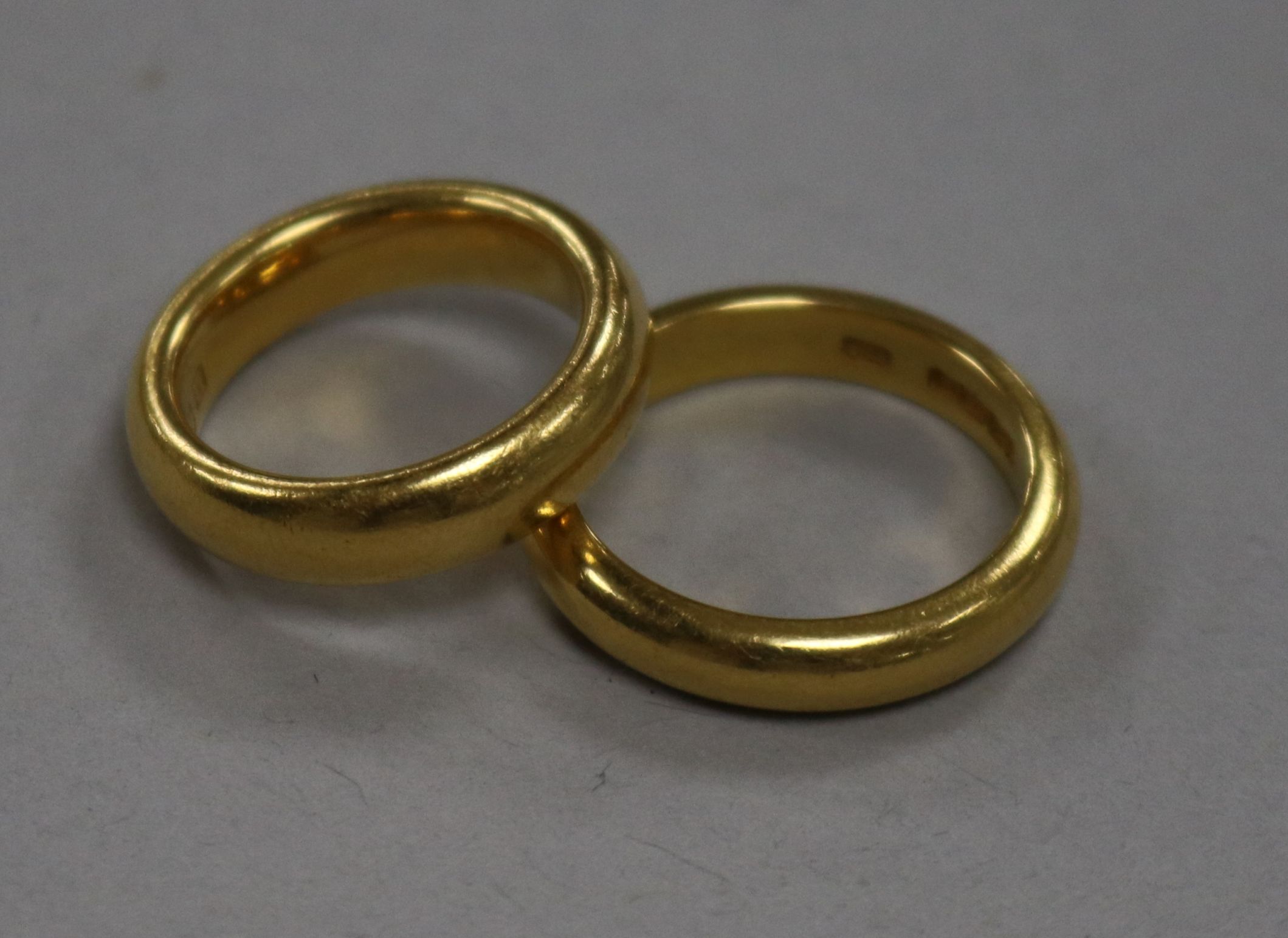 Two 22ct gold wedding rings, 19.5g gross