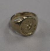 An 18ct white gold signet ring, with intaglio crest and motto 'Dread God' (Clan Munro), hallmarked