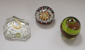 Three paperweights