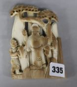 A mammoth ivory carving with typical brown skin height 39cm