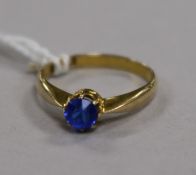 A 14ct gold ring set with a blue paste ring, gross 1.9 grams, size K
