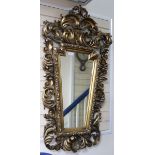 A cartouche shaped gilt wall mirror W.75cm