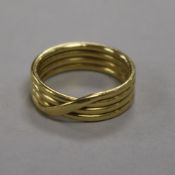 An 18ct yellow gold reeded cross-over wedding band, 9.9g, size T.