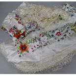 An embroidered shawl, Maltese lace shawl and embroidered pieces