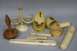 A group of ivory sewing items and other items