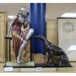 An Art Deco onyx and bronze spelter figure and dog group height 40cm