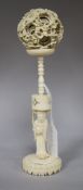 A Chinese ivory puzzle ball and stand total height 23cm