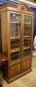 A 1920's oak and leaded glazed bookcase W.90cm