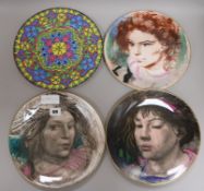 Four Royal Doulton plates, three signed diameter 26.5cm