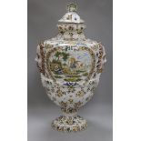 A large French faience urn and cover height 60cm