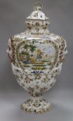 A large French faience urn and cover height 60cm