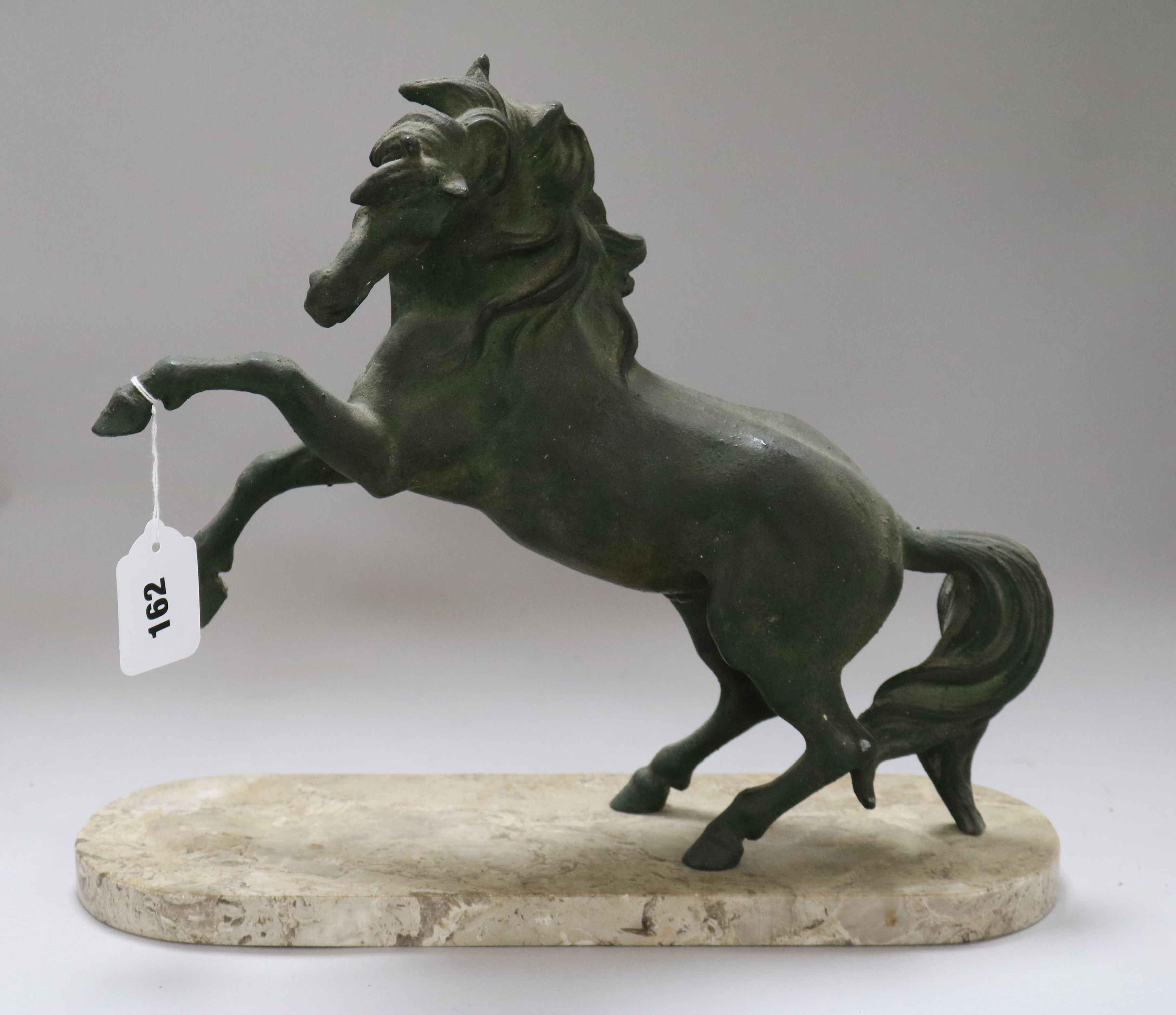 A spelter model of a stallion on marble base height 32cm