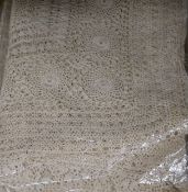 A large collection of embroidered and crochet cloths etc