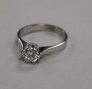 A 14ct white gold and solitaire diamond ring, size O.