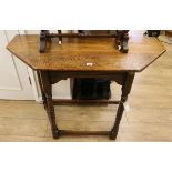 A reproduction oak credence table W.107cm
