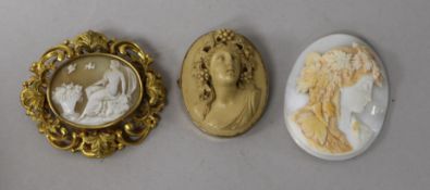 A 9ct gold mounted cameo lave brooch, one other cameo brooch and an unmounted cameo.