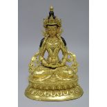 A Chinese gilt bronze seated Buddha height 23cm