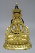 A Chinese gilt bronze seated Buddha height 23cm