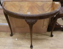 A 1930's 'D' shaped side table W.88cm