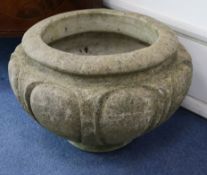 A Compton-style stone garden pot