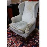 A George III style wing armchair