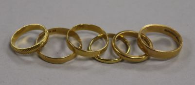 Six 22ct yellow gold wedding rings, 20.9g gross