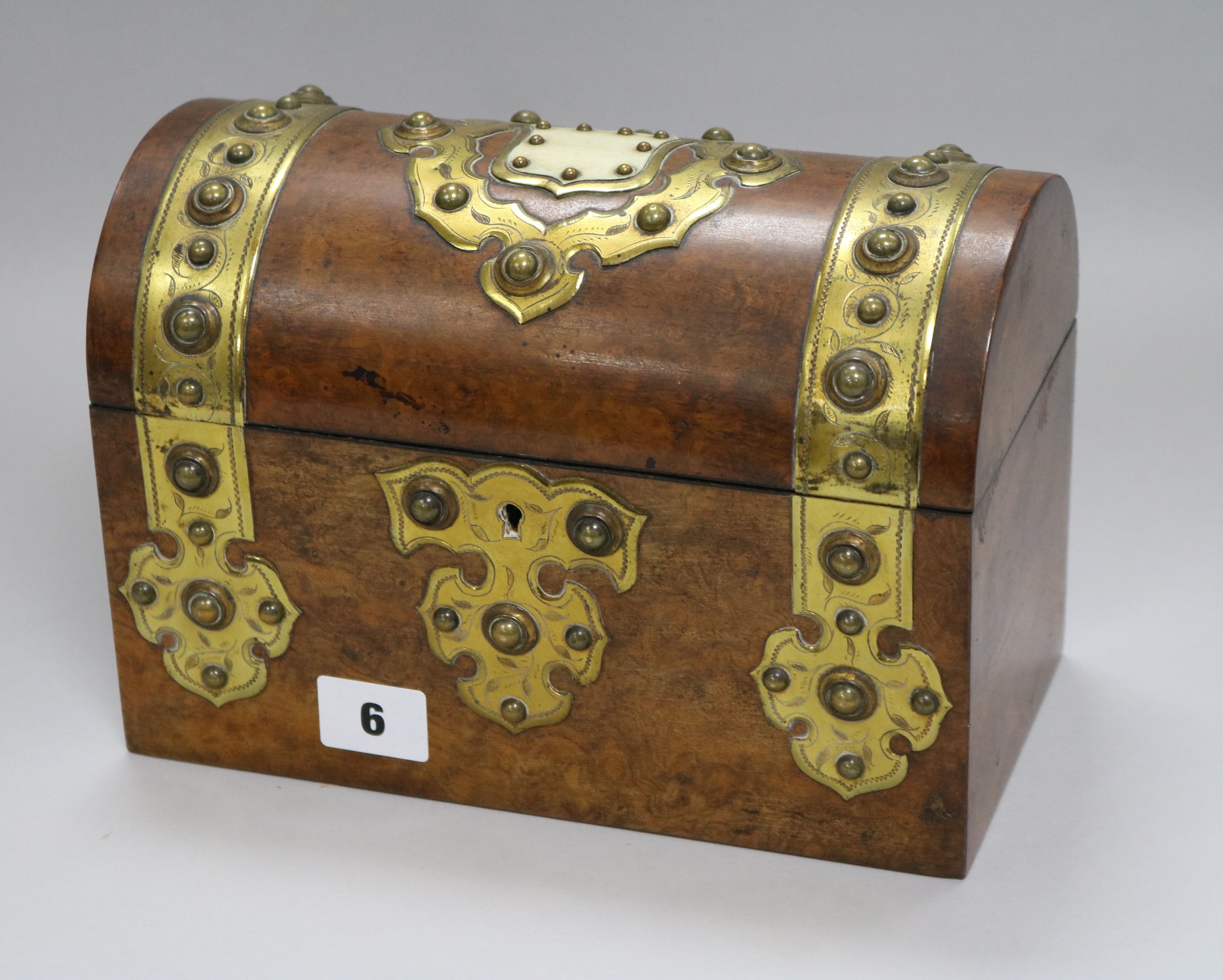 A walnut brass mounted dome topped caddy height 18cm