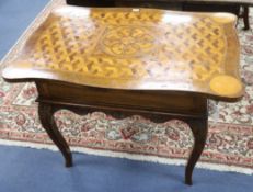A German parquetry top carved table W.93cm