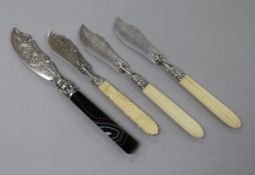 Three Victorian ivory handled silver butter knives including a pair and a similar banded agate