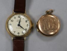 A lady's 9ct gold Astral wrist watch and a 9ct gold locket.