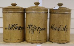 A set of three toleware canisters height 30cm