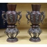 A pair of Chinese bronze two handled vases