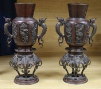 A pair of Chinese bronze two handled vases