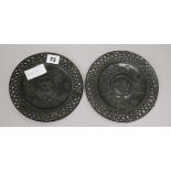 A pair of bronze circular plaques diameter 18cm