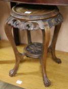 A hardwood vase stand W.43cm