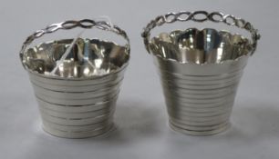 A late George II silver cream pail London, 1759 (a.f.) and a similar modern silver cream pail.