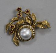 A Givenchy 14ct gold, mabe pearl, ruby and diamond floral spray brooch in Harrods box, 37mm.