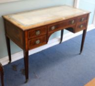 An Edwardian mahogany and satinwood banded writing table W.122cm