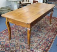 A cherrywood farmhouse table, with drawer W.187cm