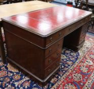 A Victorian mahogany pedestal desk, fitted nine small drawers W.151cm