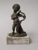 A bronze figure of a cherub