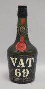 A Sandemans VAT 69 Scotch ½ bottle