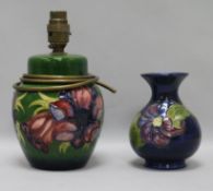 A Moorcroft 'Clematis' vase and a 'Peony' lamp base