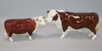 A Beswick Hereford bull 2549A and cow 1360, gloss