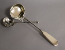 A late 19th century Russian 84 zolotnik silver fiddle pattern soup ladle, 1889 and a Russian